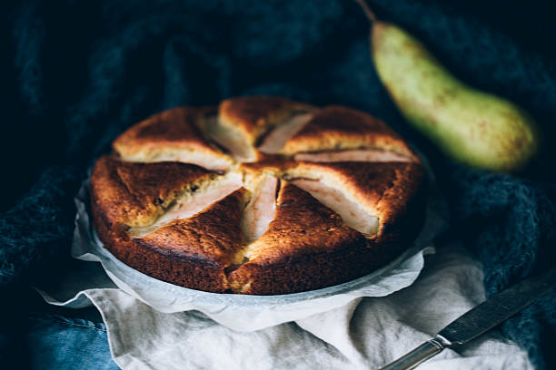 istock sweet biscuit cake with yellow pears 502990020