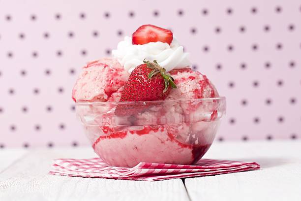 melted strawberry ice cream stock photo
