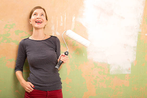 istock happy girl painting 502990570