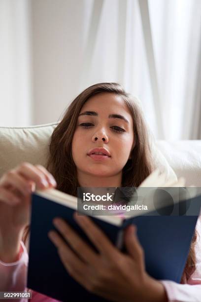 Teenage Girl Reading Stock Photo - Download Image Now - Adolescence, Apartment, Beautiful People