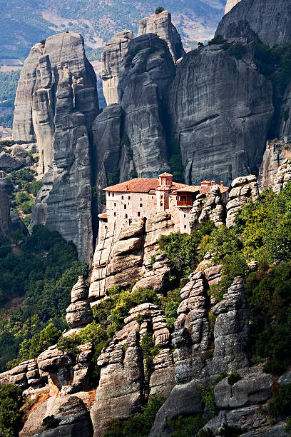 istock Mountain monastery on the rocks in Meteora, Greece 502991102
