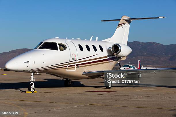 Private Jet Stock Photo - Download Image Now - 2000, Air Vehicle, Airfield