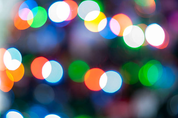 istock Christmas lights colorful bokeh defocused abstract pattern. 502991846