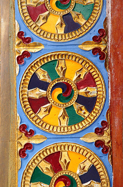 Colourful wheel and murals engraved on Shanti Stupa