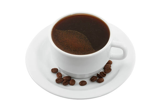 istock Cup of black coffee on a saucer isolated 502992191