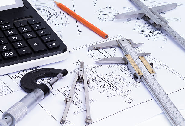 Engineerung tools on technical drawings stock photo
