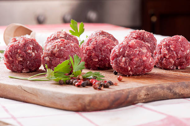 istock Raw meatballs with spices 502993217