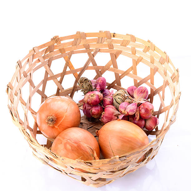istock Onions with basket on white background 502993777