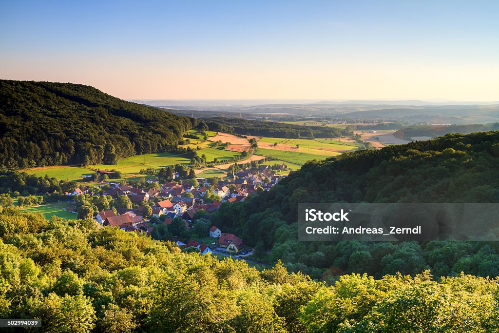 Bavarian Rural Countryside Landscape Idyllic Bavarian Rural Countryside Summer Landscape. Picturesque Hills in Upper Franconia, Germany. Villages and rocky terrain at the jurassic mountains with green forrest Upper Franconia Stock Photo