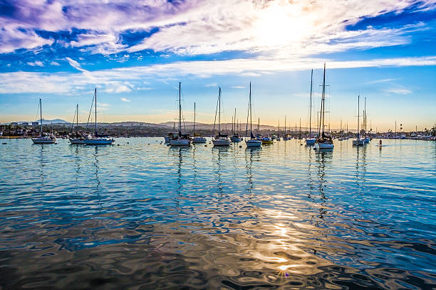 Yachts in Harbor Yachts anchored in Newport Beach, California  newport beach california stock pictures, royalty-free photos & images