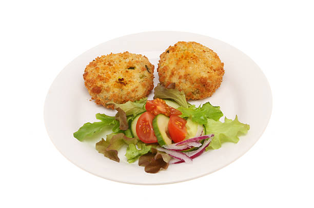 istock Fish cakes and salad 502994414