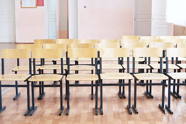 istock Rows of wooden chairs 502994600