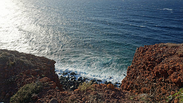 istock wild and natural coast of greece island santorini 502995110