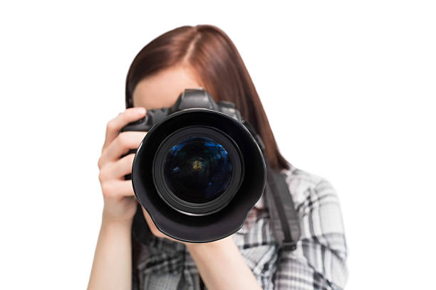 istock Young casual photographer taking picture of camera 502995215
