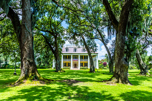 Darrow, USA - July 14, 2013: famous Houmas House plantation in Darrow, USA. Irishman John Burnside bought the plantation in 1857 for USD 1 million.