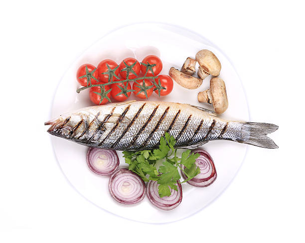 istock Grilled seabass with fresh vegetables. 502996173