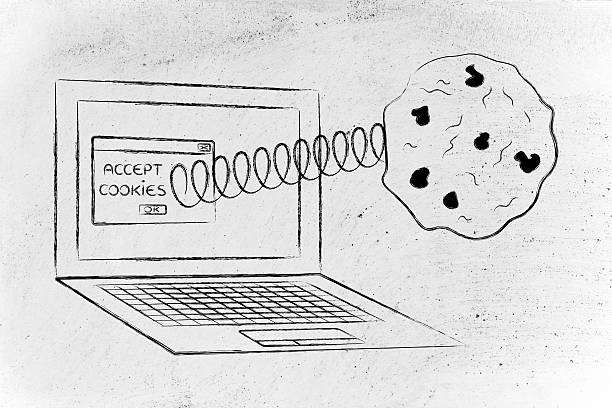 cookies coming out of laptop screen from a browser stock photo