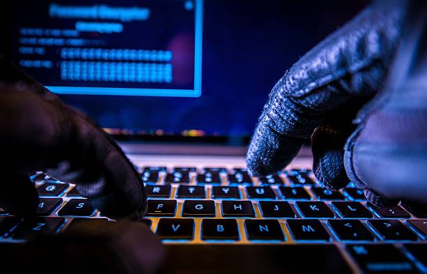 Payments System Hacking Payments System Hacking. Online Credit Cards Payment Security Concept. Hacker in Black Gloves Hacking the System. hacker stock pictures, royalty-free photos & images