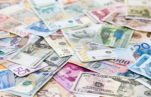 verschiedene währungen - currency exchange stock-fotos und bilder