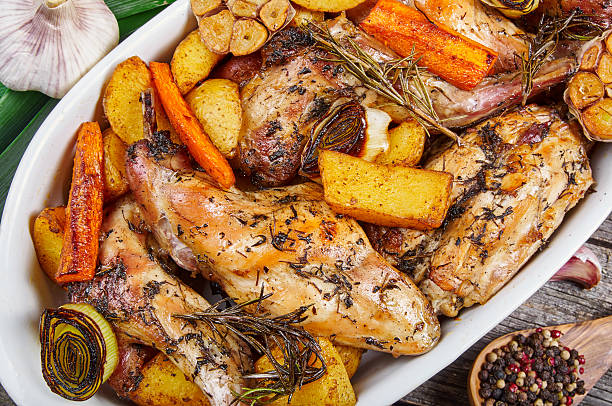 istock Roasted rabbit with herbs and vegetables 503002552