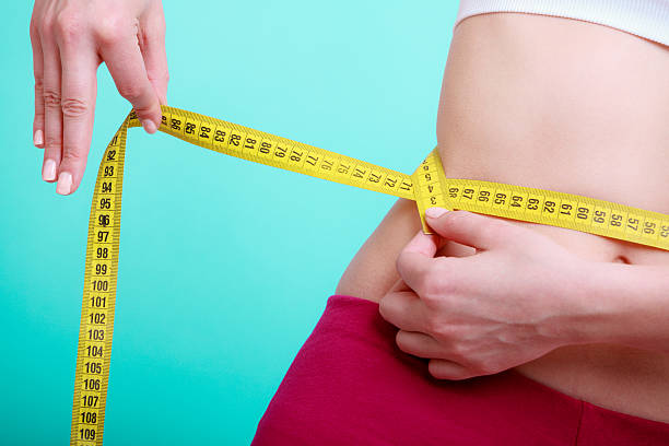 Diet Fitness Woman Fit Girl With Measure Tape Measuring Waist Stock Photo -  Download Image Now - iStock