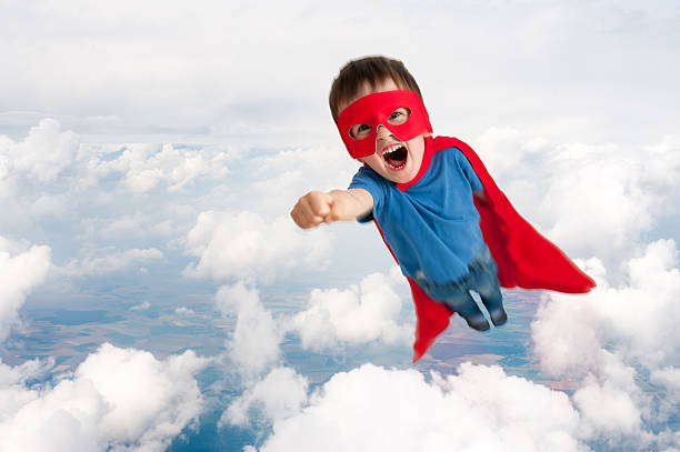 istock superhero child boy flying 503007155