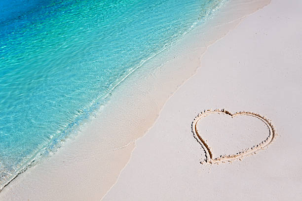 istock Heart on Beach Sand in Tropical Paradise 503007159