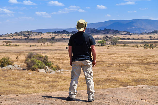 istock man from behind watching the horizon 503007189