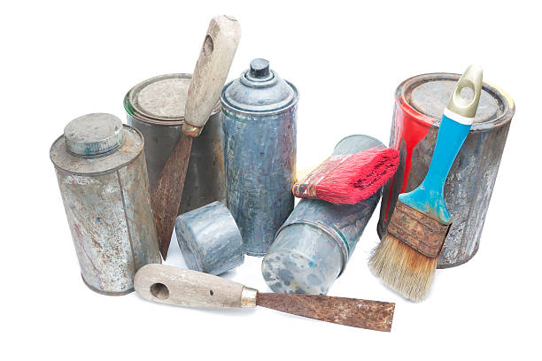 istock Old used spray cans and paint bucket 503008445
