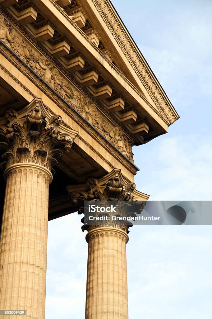 Classic Corner Pillars of the L'église de la Madeleine in Paris. The Madeleine Church is a Catholic Chuch in the  8th arrondissement of Paris Antiquities Stock Photo