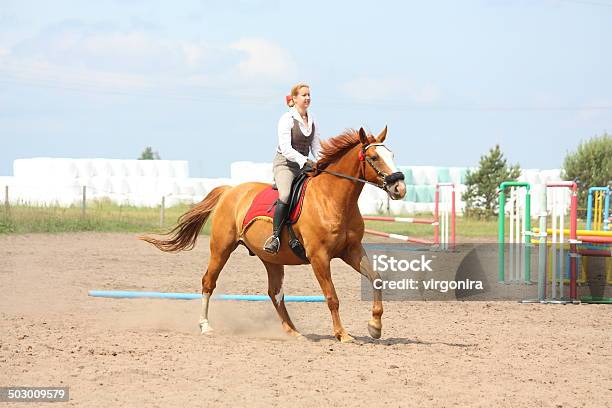 Beautiful Young Blonde Woman Riding Chestnut Horse Stock Photo - Download Image Now - Adult, Agricultural Field, Ammunition