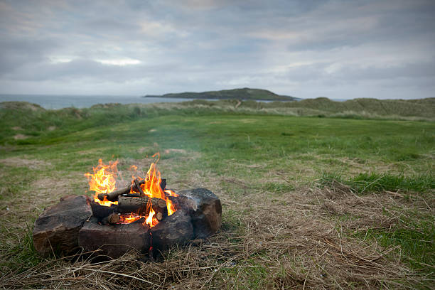 Camp Fire A camp fire in the Highlands of Scotland beach fire scotland stock pictures, royalty-free photos & images