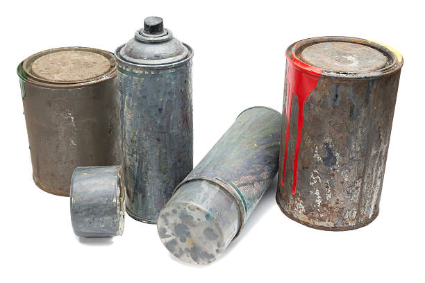 istock Old used spray cans and paint bucket 503011795