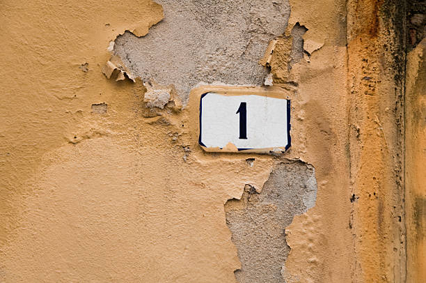 istock Number one sign on scraped wall 503012071