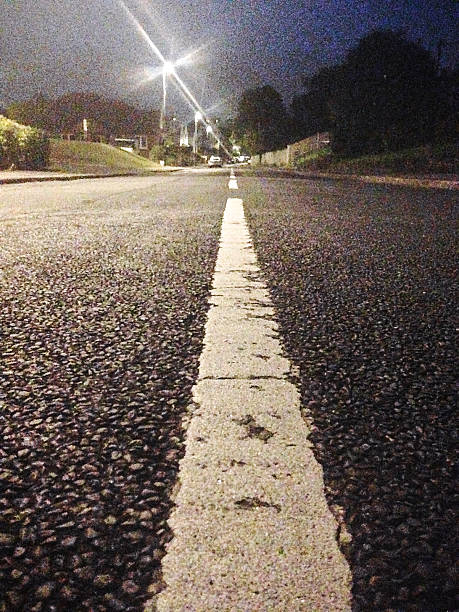 istock asphalt close up on the night city 503012341
