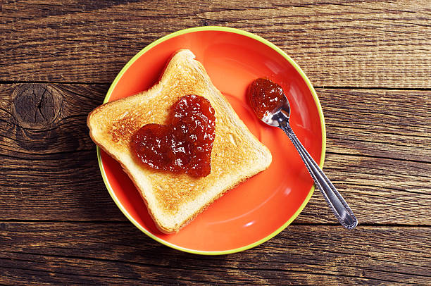 istock Toast bread with jam in shape of hearts 503013423