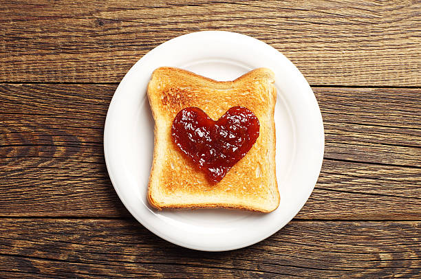 istock Toast with jam in shape of hearts 503013427
