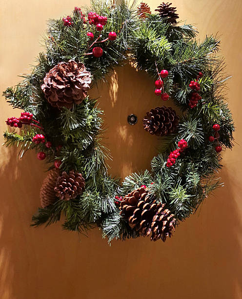 istock Pine Cones And Berry Wreath On The Front Door 503015432