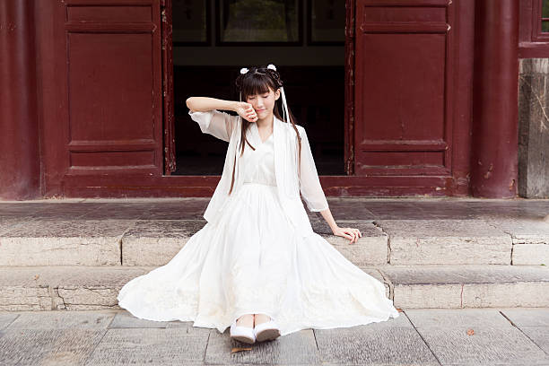 chinese characteristics in the courtyard, there is a pretty girl standing there