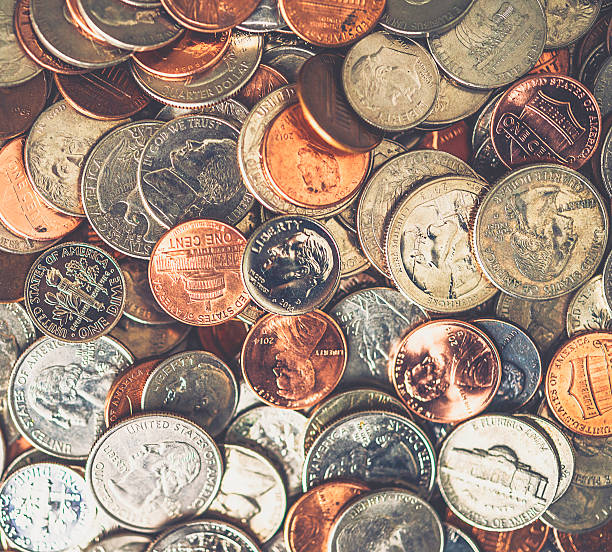 istock American currency coins background 503017346
