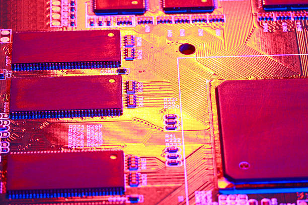 istock Gold yellow with red light of circuit board with processor close-up 503018126