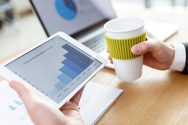 istock businessman checking financial reports on table 503019262