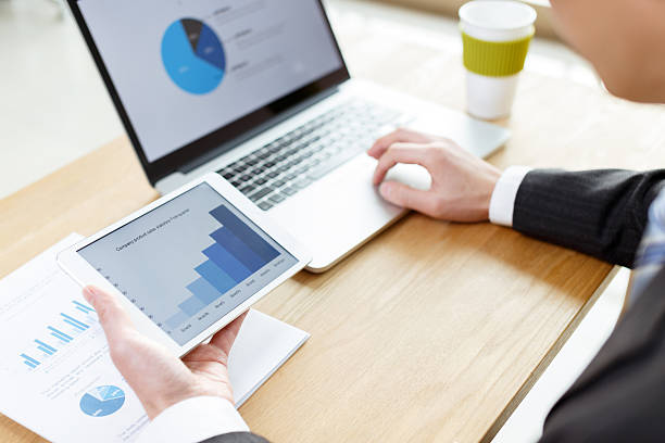 istock businessman checking financial reports on table 503019276