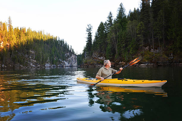 istock Lake Kayaker in afternoon light 503019416