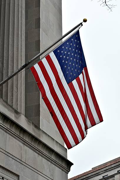 istock US flag on front of building 503019494