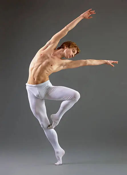 modern ballet dancer on grey background