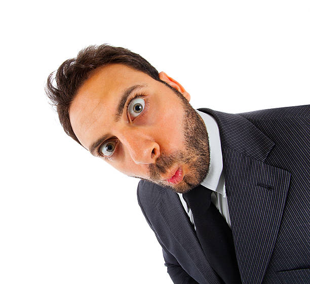 Young businessman with surprise expression