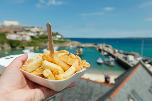 Carton of Chips over Newquay Harbour on a bright sunny June day.