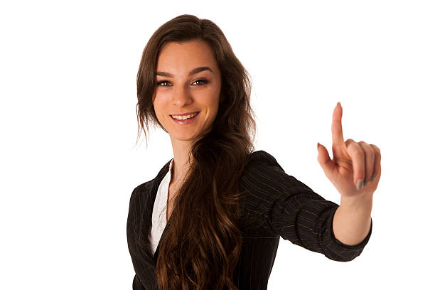 Beautiful young asian caucasian woman pressing a button on transparent screen isolated over whitte background