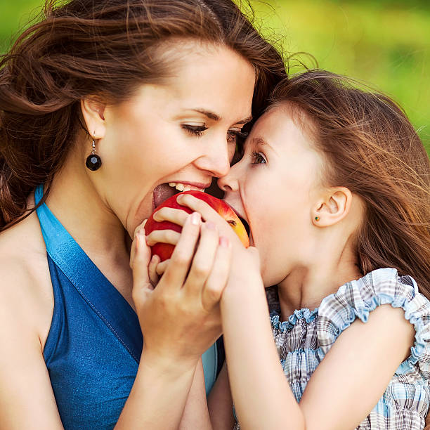 istock Mother and daughter in park 503027341